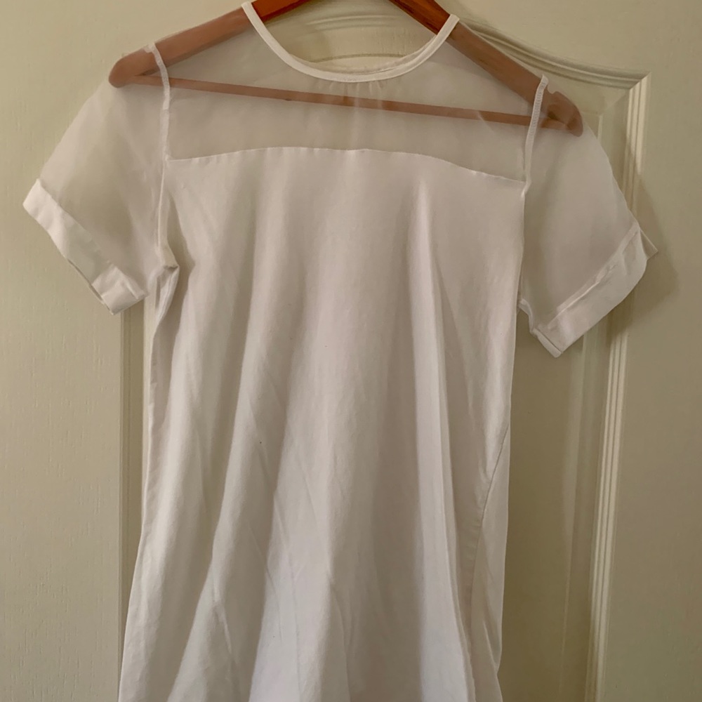 Really cute short sleeve t-shirt with sheer accents